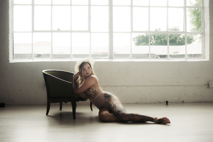 Tattooed girl boudoir photo shoot