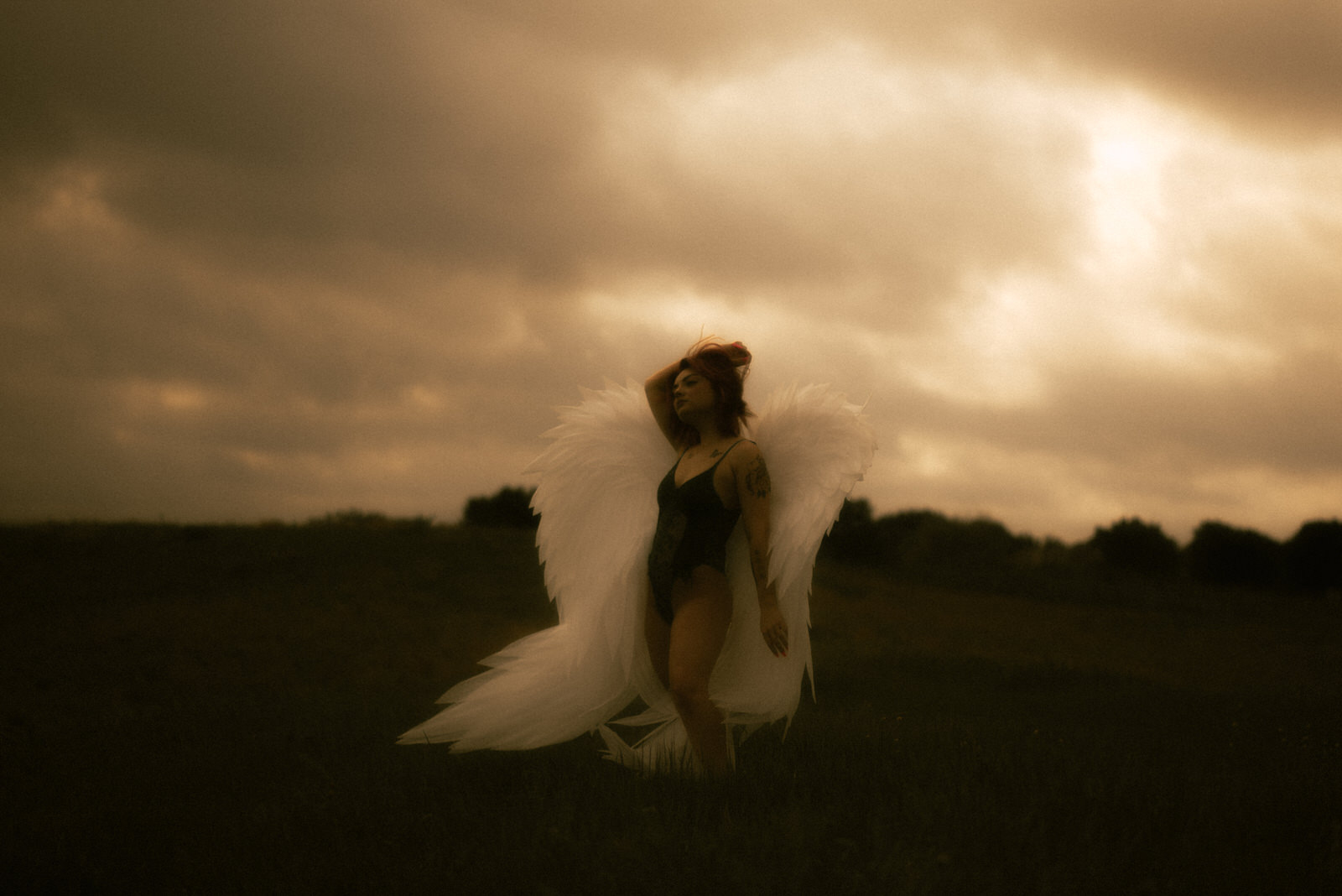 Emotional photoshoot with angel wings