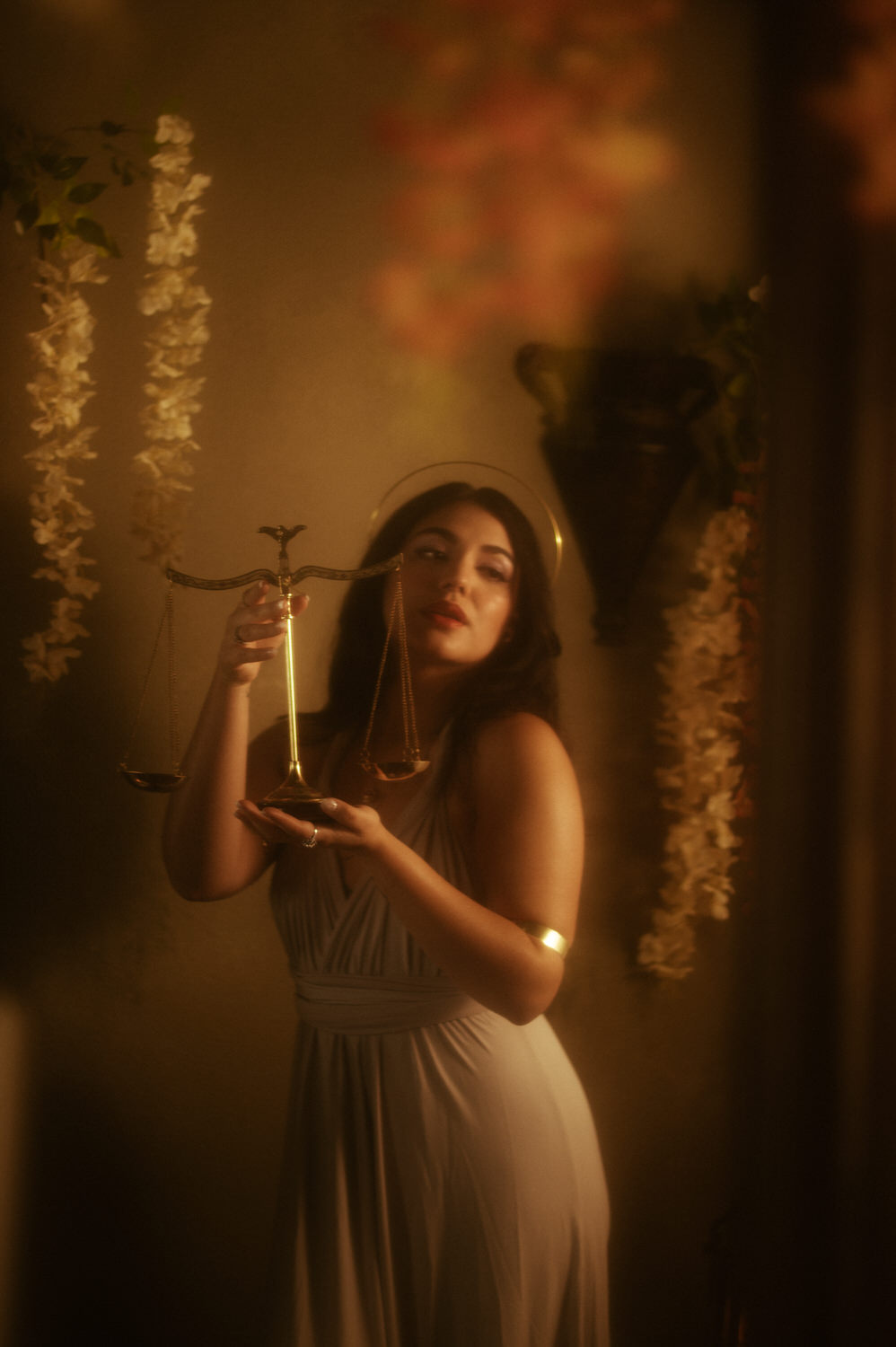 a woman holding a scale