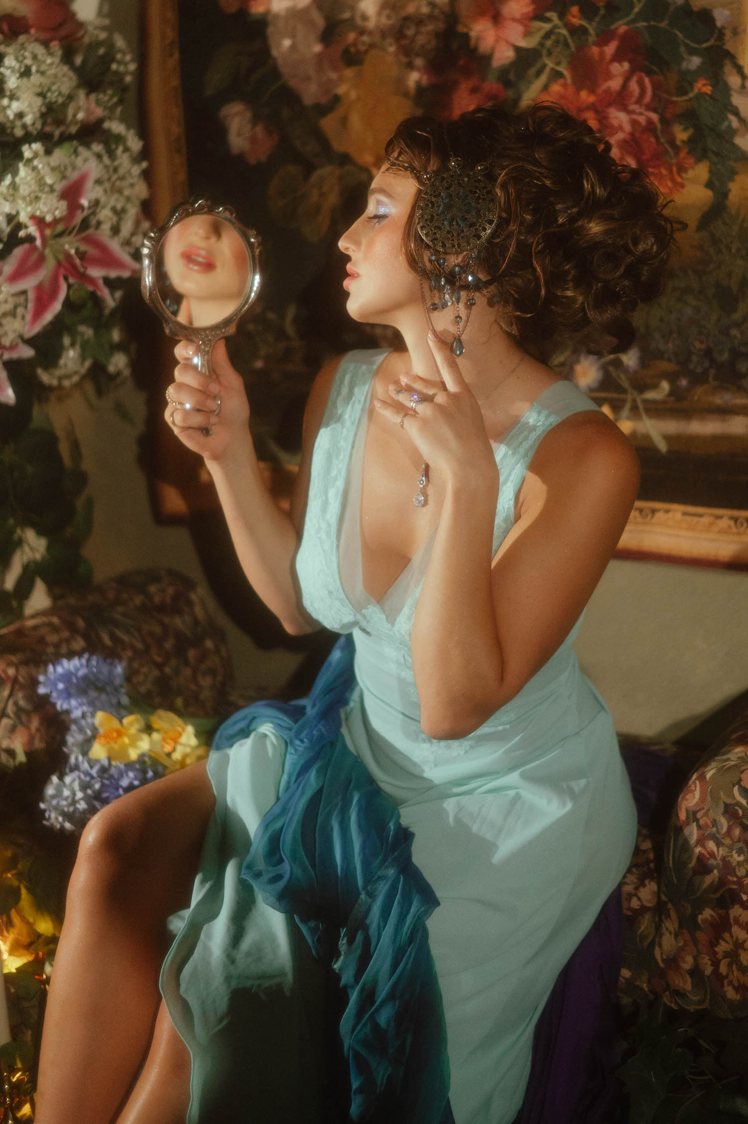 This portrait captures classic Art Nouveau style. Shot inside Royal Lune Studio near Dallas, a model poses with an ornate headpiece while holding a mirror.